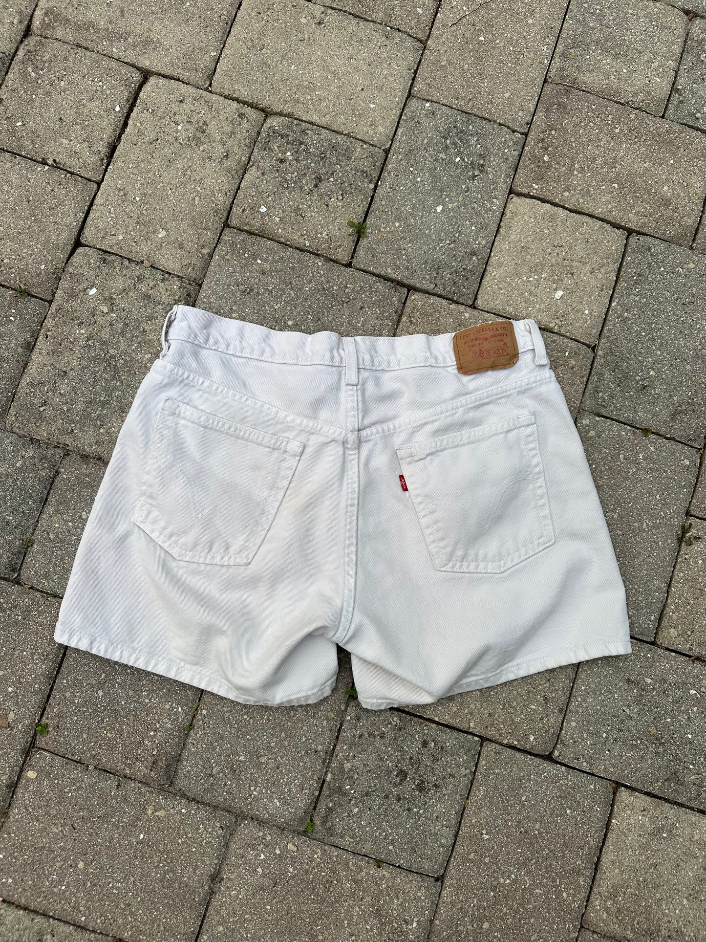 white denim Levi shorts