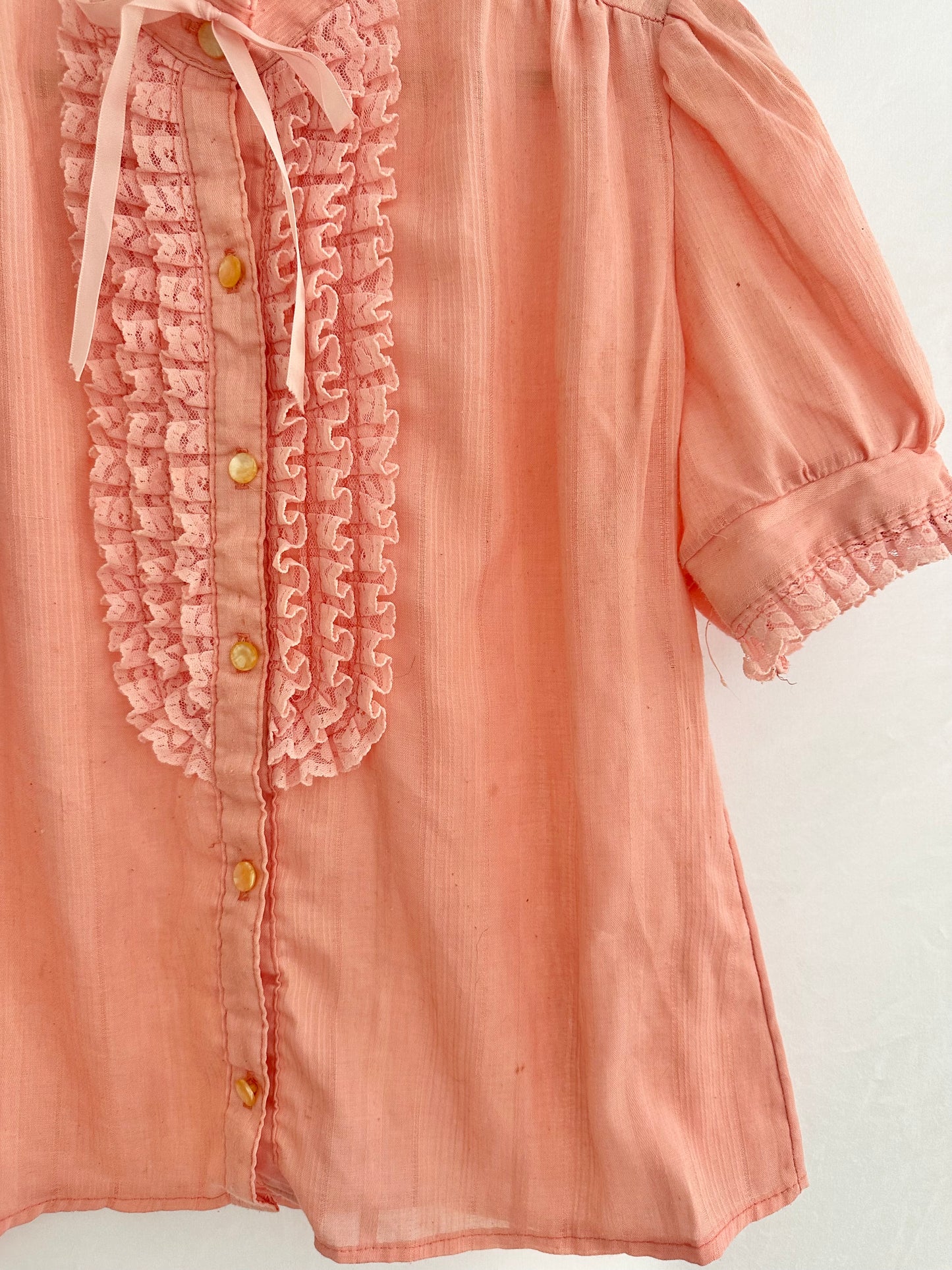 pink ruffle blouse