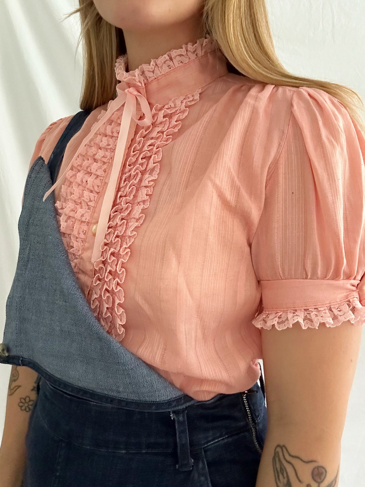 pink ruffle blouse