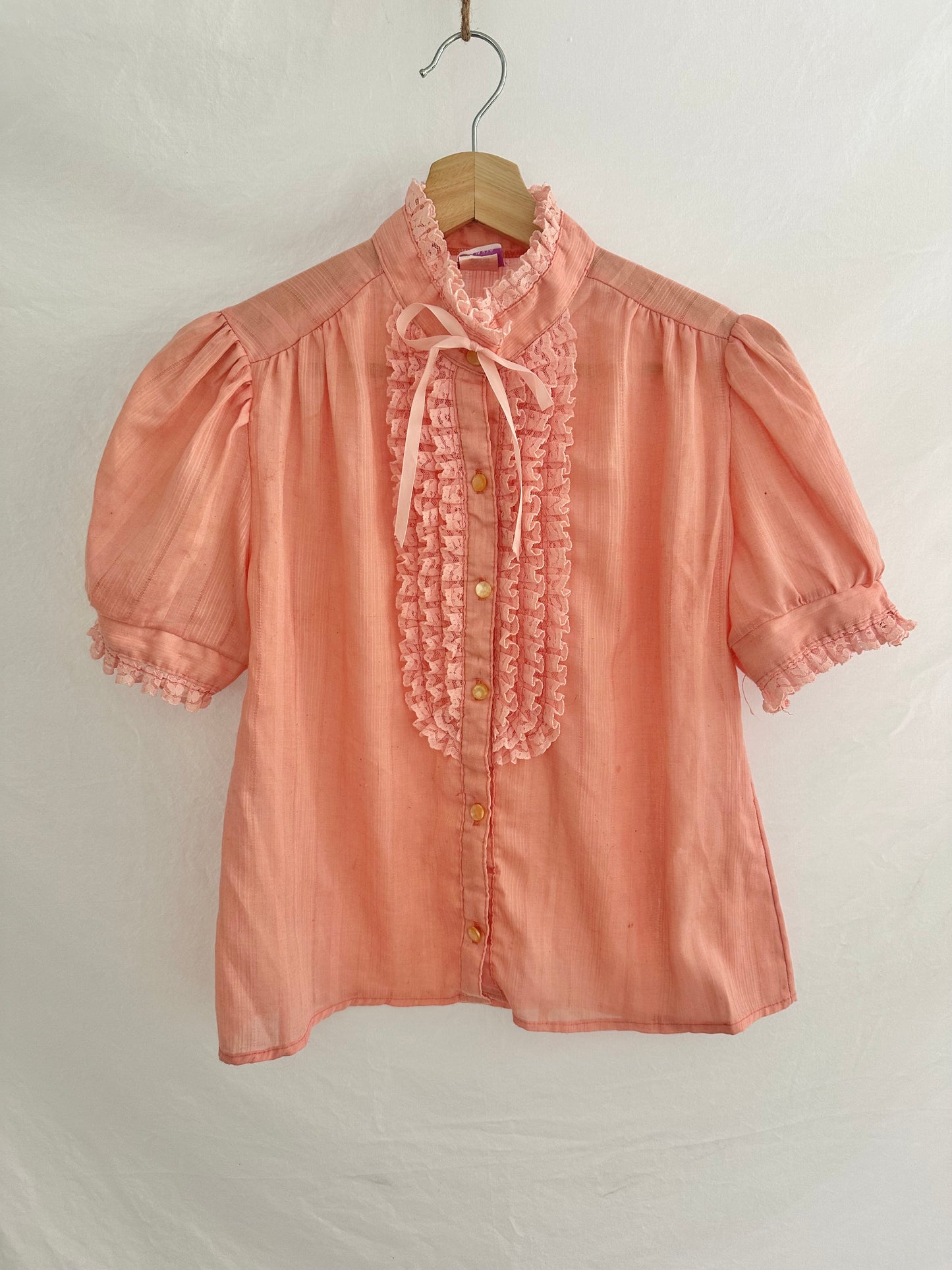 pink ruffle blouse