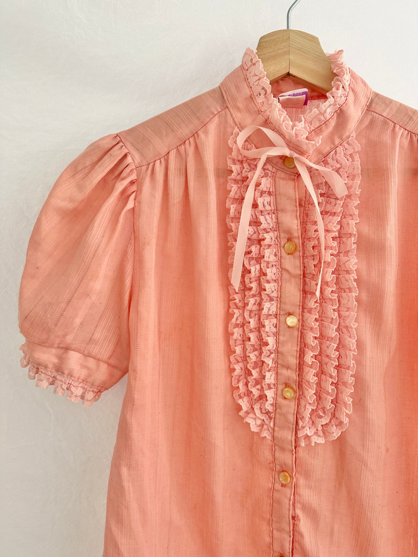 pink ruffle blouse